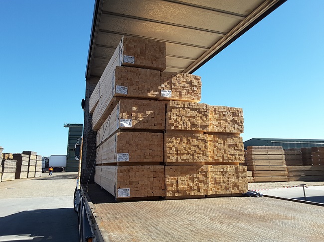 Image of pine timber packs on truck.