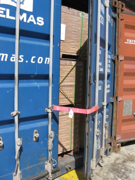 Image of container doors with restraint attached
