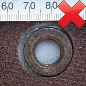 Image of unsafe excessive clearance for the central hole on 356 mm disc on 9 inch spindle flange.