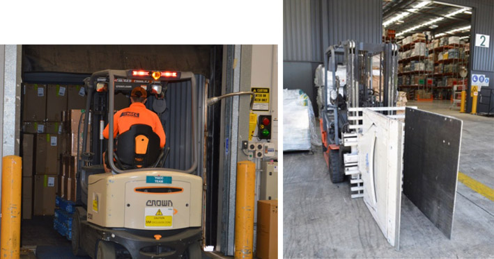 Image of workers using suitable equipment to unload like a fork lift truck with grabs