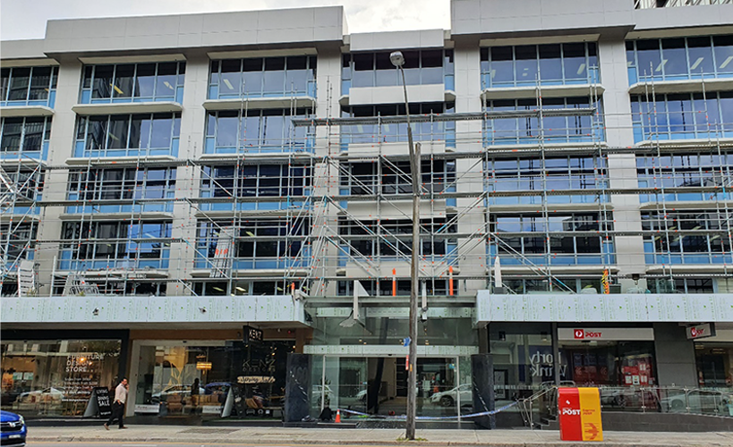 The building in which a worker fell through a glass atrium