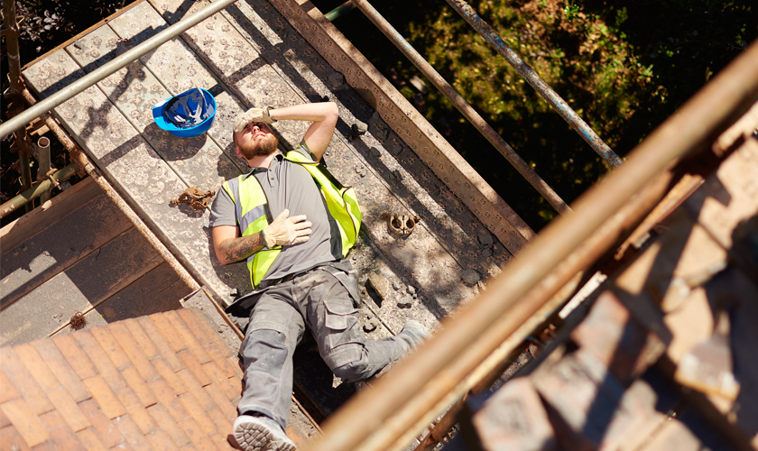 Man lying down on construction site