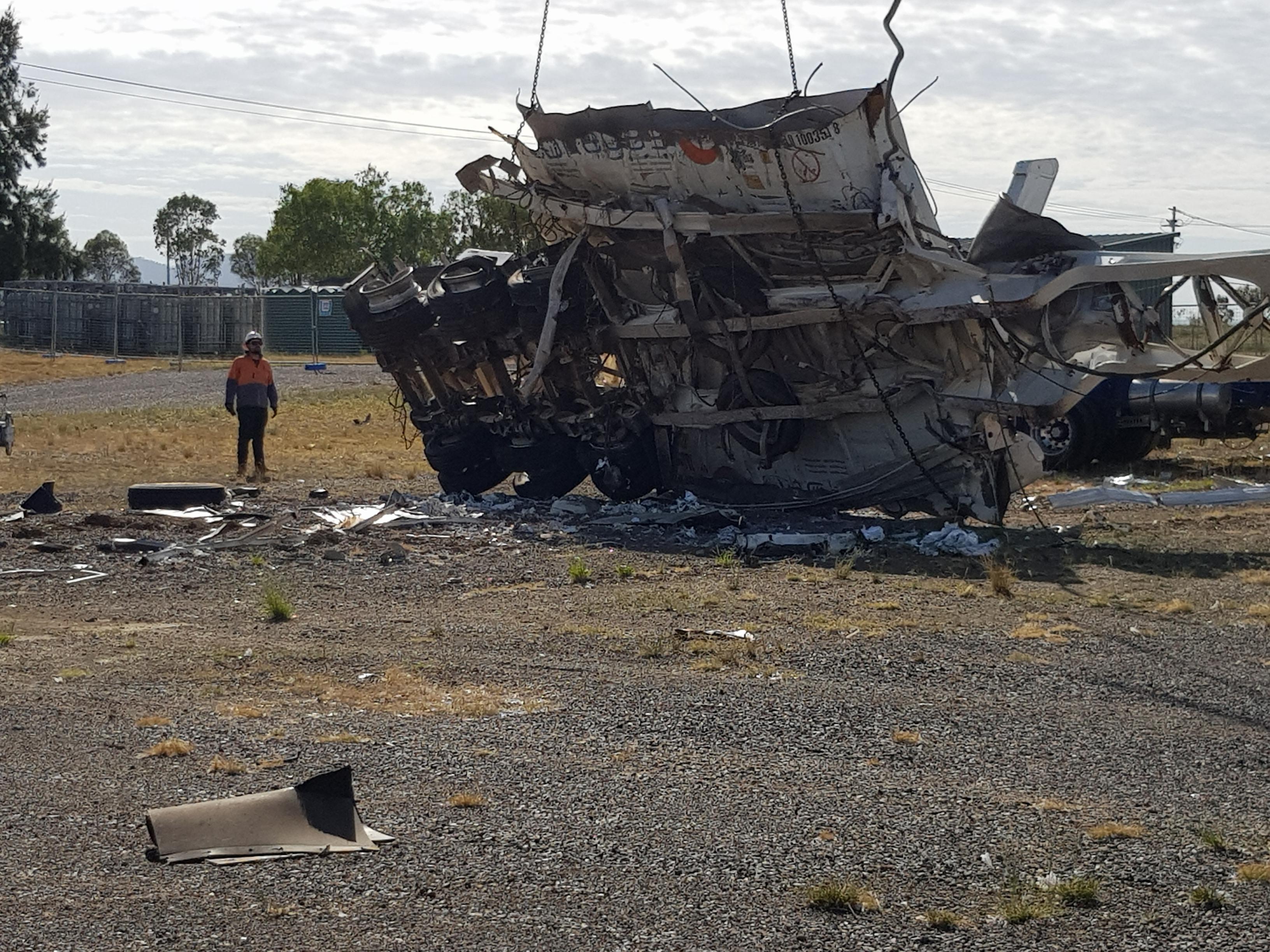 Image of container and trailer remnants