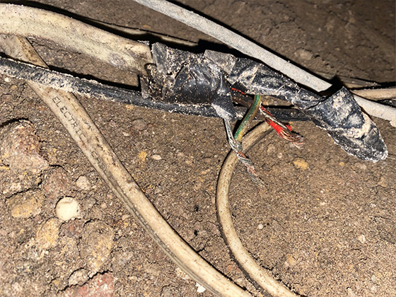 Faulty wiring underneath the house that caused the incident.