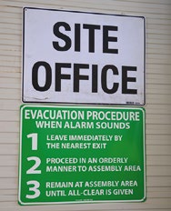 On site office sign and green excavation instructions