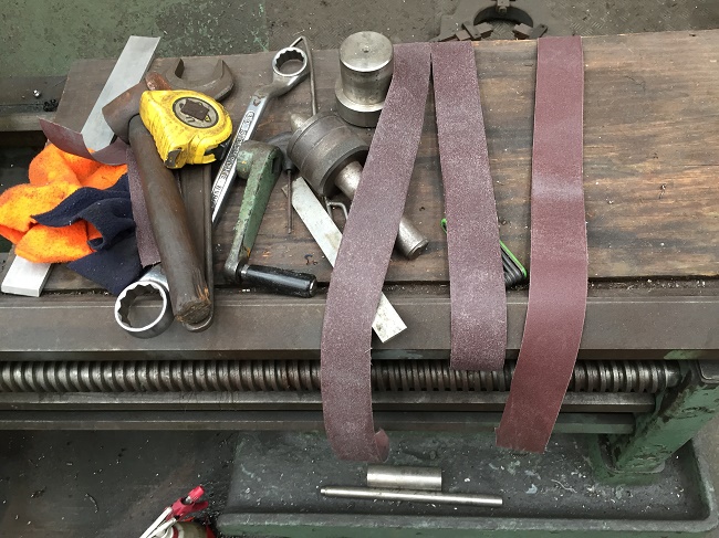 Image of emery cloth and other metalworking tools