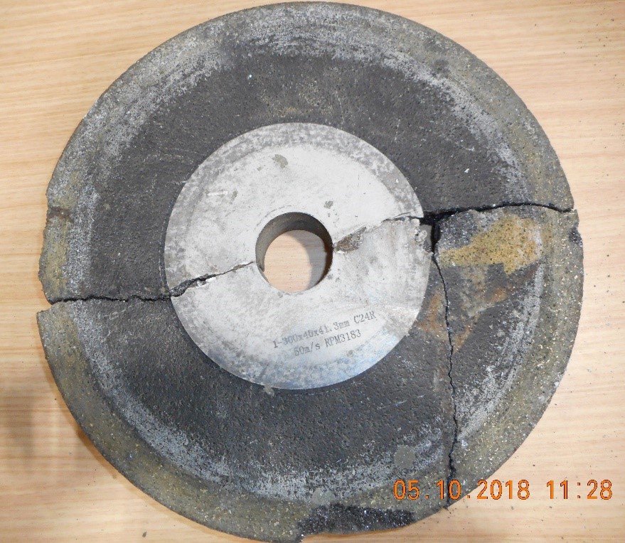 Figure 1 shows an example of a bonded abrasive wheel (300mm diameter) which broke apart during operation, resulting in fatal injuries to the operator.