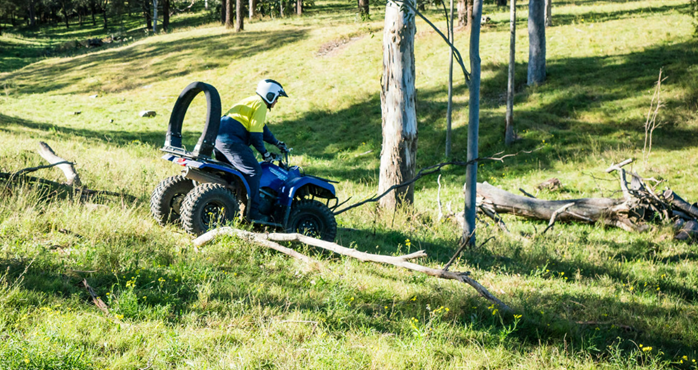 Image of a person on a blue quad bike