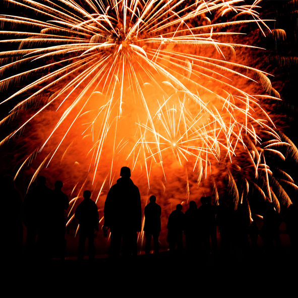 Fireworks display with spectators