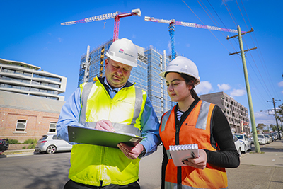 SafeWork NSW Inspectors outside a construction site