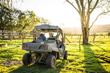 Farm vehicle in rural setting