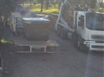 CCTV photo of the rear of a truck.