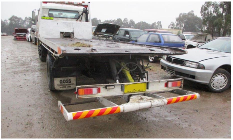 Photo of tilt tray truck involved in a fatal workplace incident