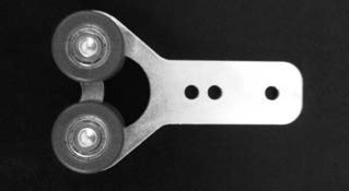 Photo of a curtain track roller on plate with double bearings
