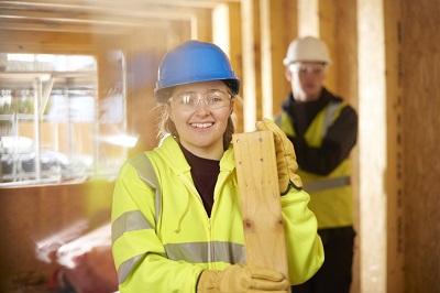 Photo of a young female construction worker.